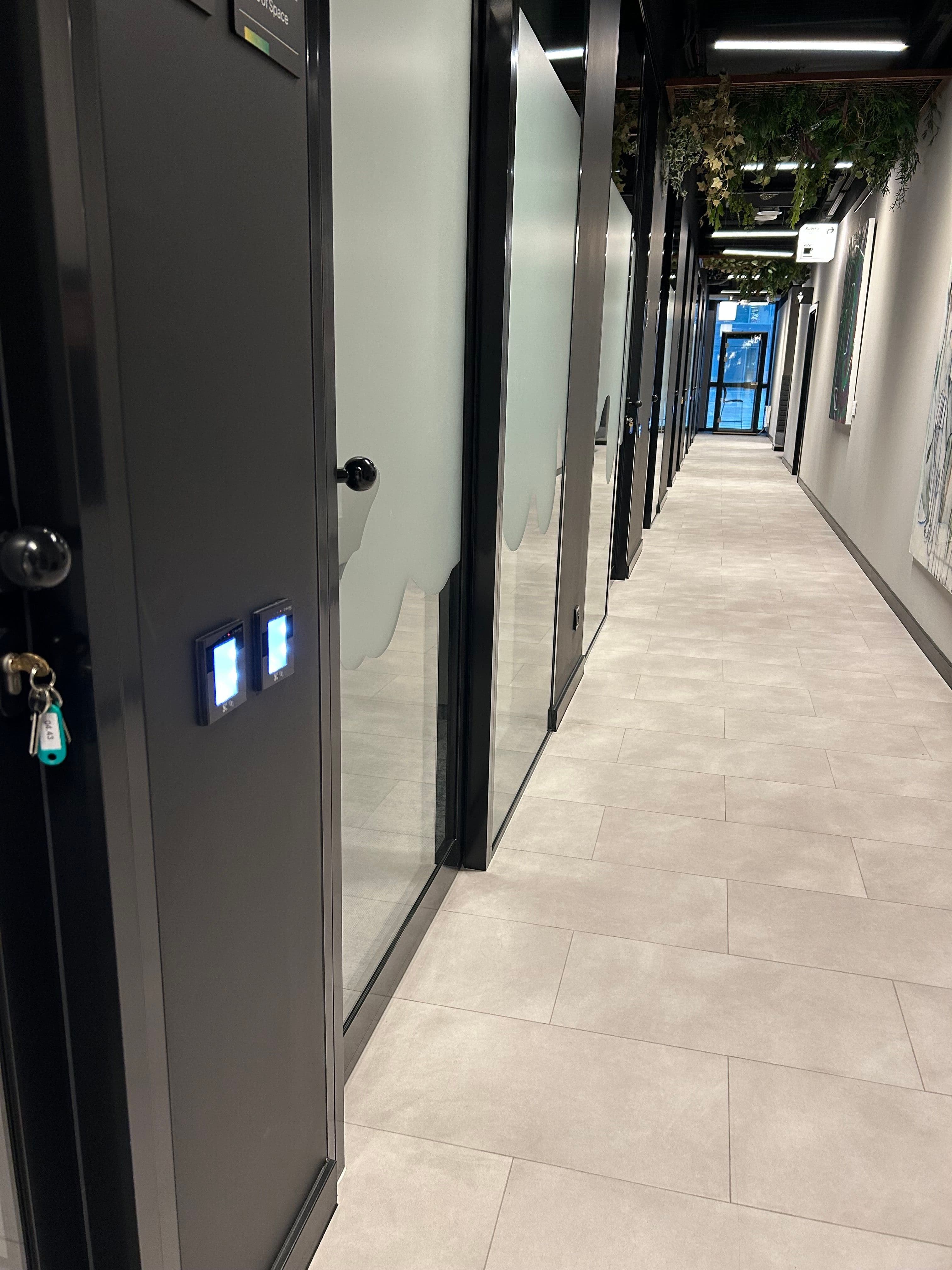 Cowork corridor with QR code scanners